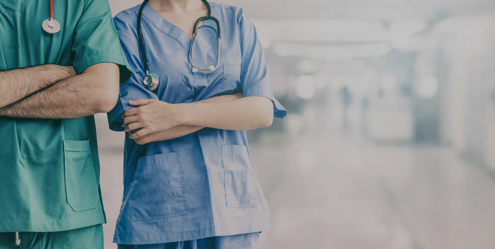 Healthcare professionals in scrubs representing respiratory therapy specialists.