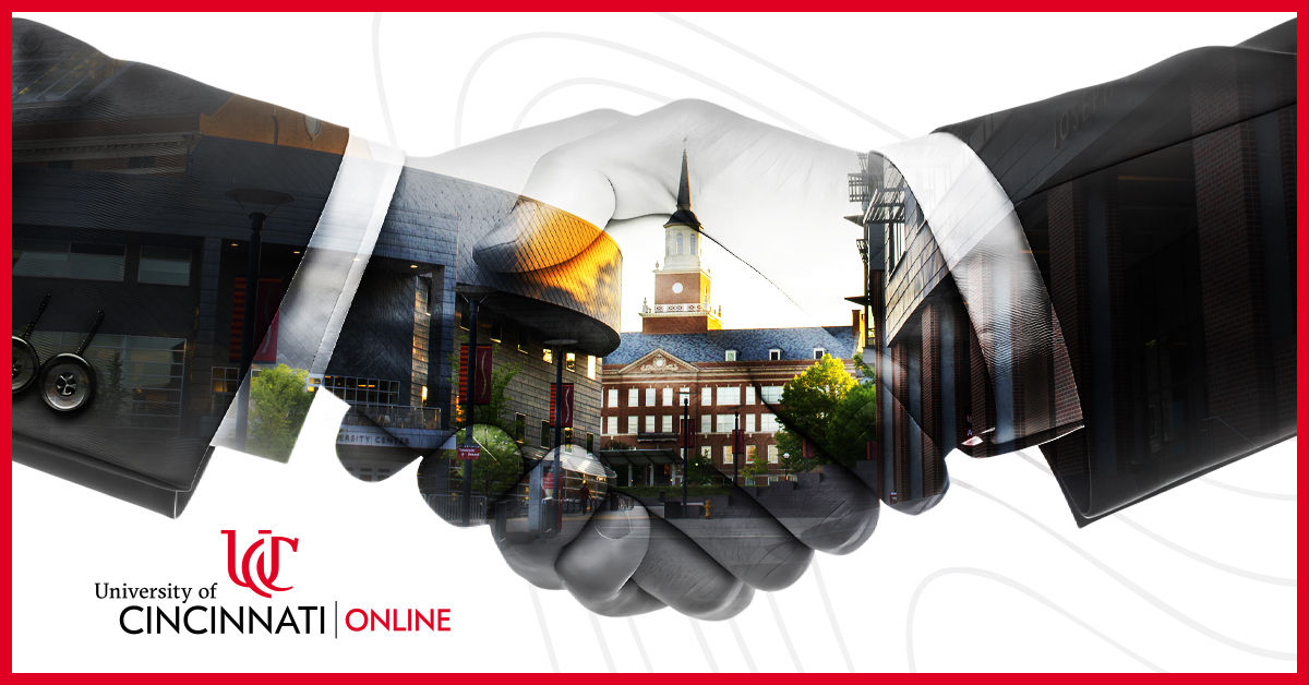 Two semi-transparent hands are seen in a handshake on top of a white background. In the space where the two hands are clasped, an exterior shot of an academic building on the University of Cincinnati campus is framed.
