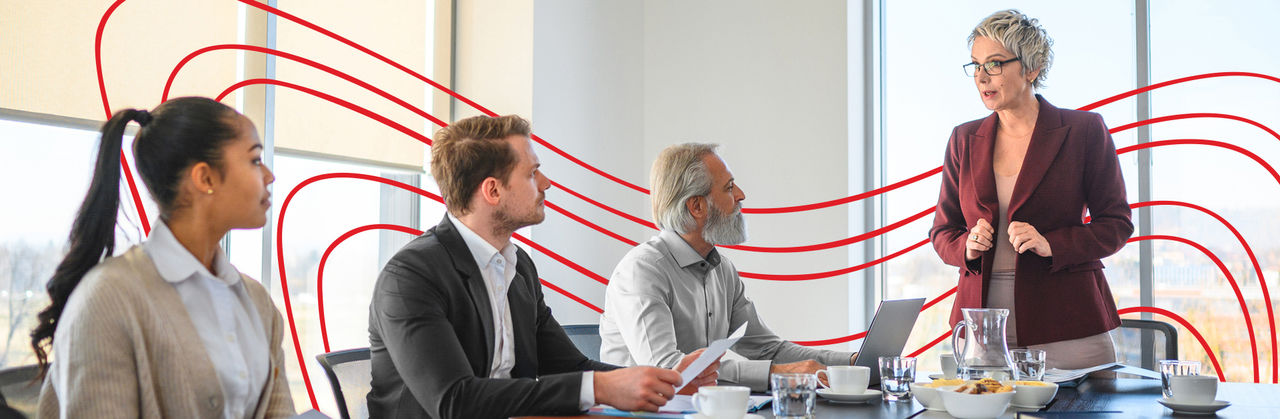 Organizational leadership manager conducting a staff meeting.