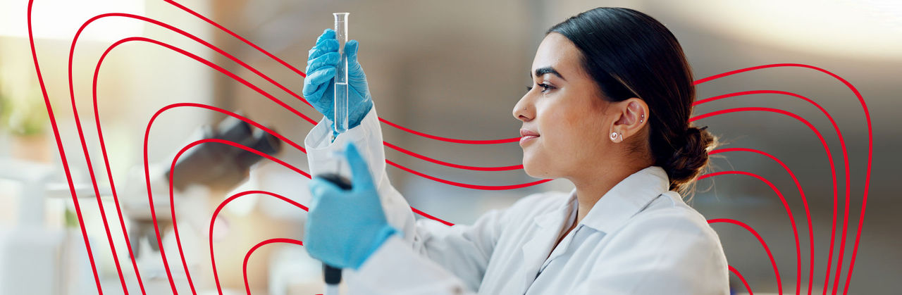 Medical Laboratory Sciences students examining with a microscope.