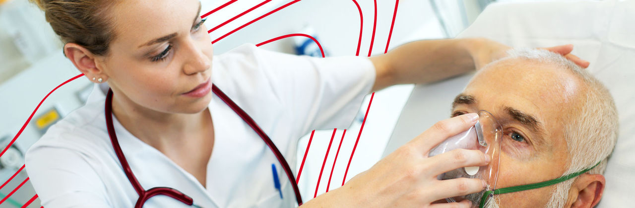 Image showing a respiratory therapist at work with a patient.