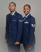 Picture showing respiratory therapy degree graduates wearing dress blue military uniforms.