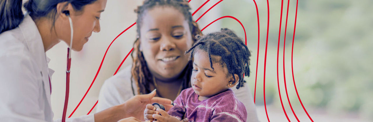 Family nurse practitioner listens to young girl patient's heartbeat